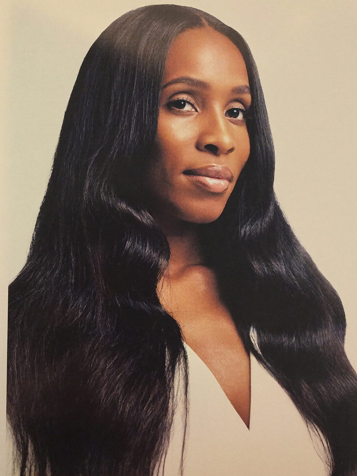 Model wearing a long body wave lace front unit